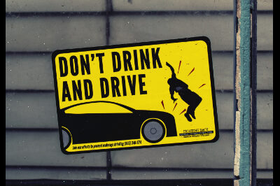 window sign about drunk driving
