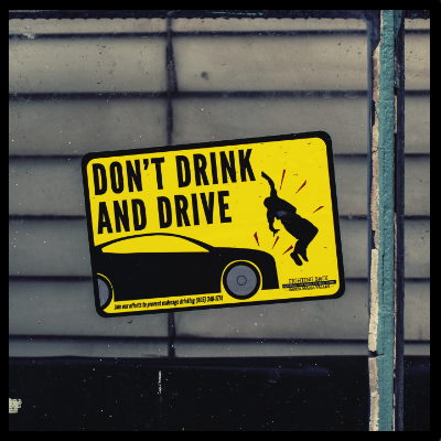 window sign about drunk driving